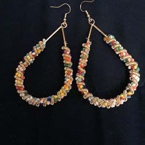 1 pr. Earrings FREE w/sweat suit purchase